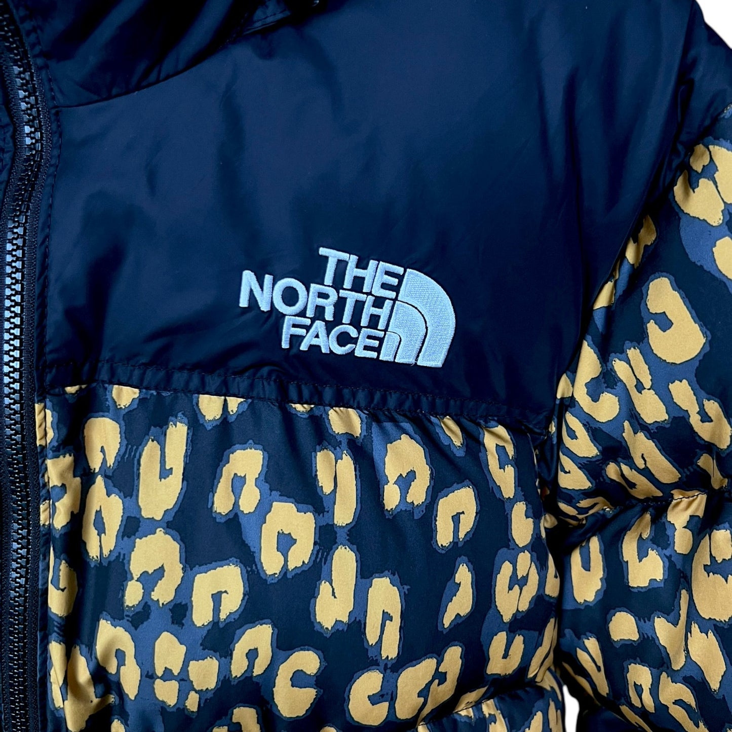 The North Face Retro 1996 Animal Print Cropped Down Puffer Jacket - $330 Retail